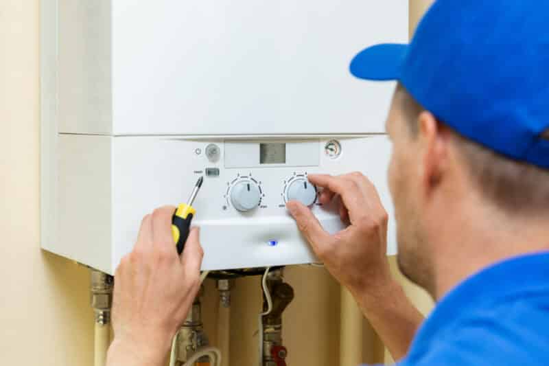 technician providing heating options for home